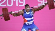 Juan Columbie от Куба по време състезание за  вдигане на тежести при мъже с тегло до 109 кг на Панамериканските игри Лима 2019 в Лима, Перу.