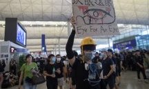 100 000 излязоха на протест в Хонконг въпреки проливния дъжд
