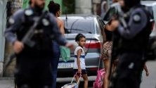 Военни части по улиците на Рио де Жанейро. На 20 септември 8-годишно момиче почина, простреляно в гърба по време на спецоперация в беден квартал.