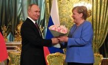 Историческа среща между Меркел и Путин